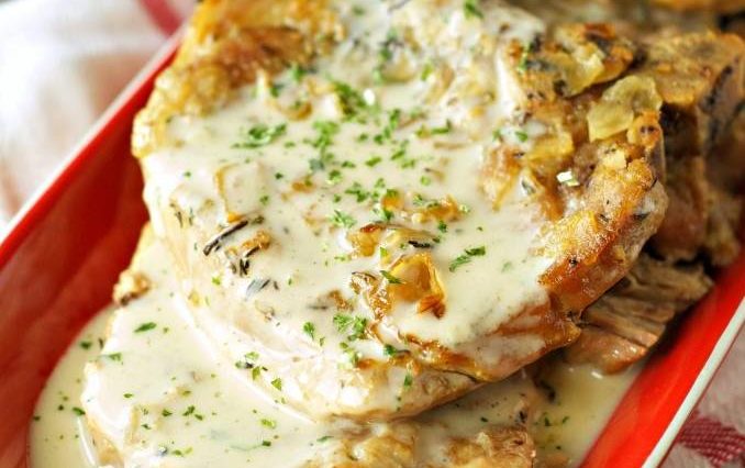 SLOW COOKER PORK CHOPS WITH CREAMY HERB SAUCE