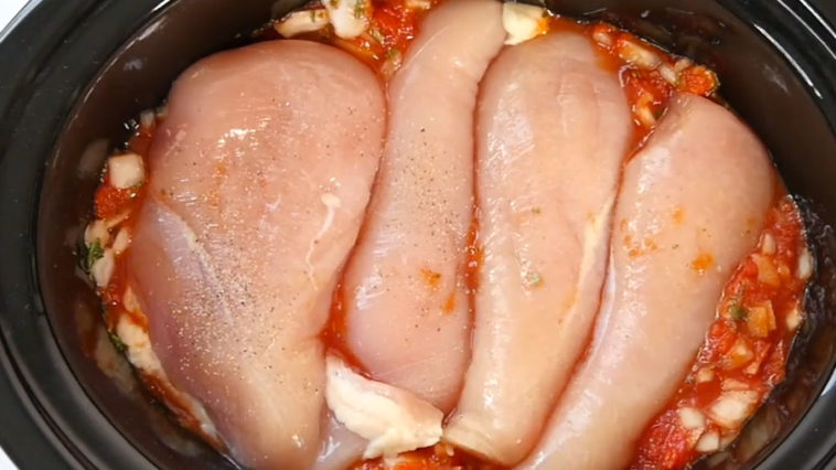 Place chicken breasts on top of crushed tomatoes. Add pasta for a meal your family will love