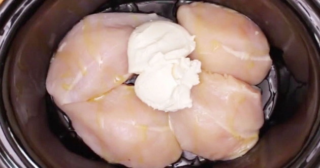 SET RAW CHICKEN AND CREAM CHEESE IN SLOW COOKER FOR THIS MEXICAN-AMERICAN DISH