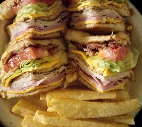 BIG MARV’S CAFE UNO GAME NIGHT CLUB SANDWICH AND FRIES